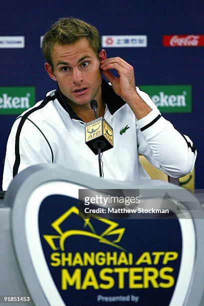 Andy Roddick of the United States fields questions from the media at a press conference after retiring from his match against Stanilas Wawrinka of...