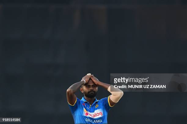 Sri Lanka cricketer Isuru Udana reacts following a miss field during the first Twenty20 cricket match between Bangladesh and Sri Lanka at the...