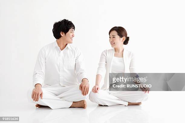 family - cross legged stock pictures, royalty-free photos & images