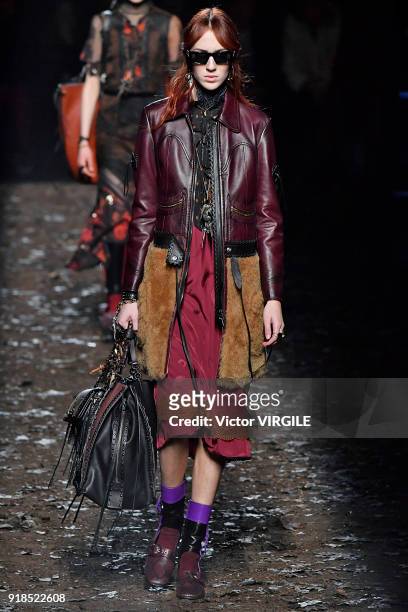 Model walks the runway at the Coach 1941 Ready to Wear Fall/Winter 2018-2019 Fashion show during New York Fashion Week on February 13, 2018 in New...