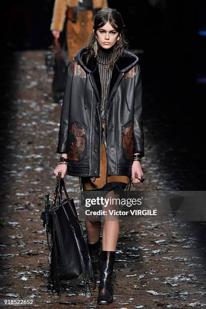 Kaia Gerber walks the runway at the Coach 1941 Ready to Wear Fall/Winter 2018-2019 Fashion show during New York Fashion Week on February 13, 2018 in...