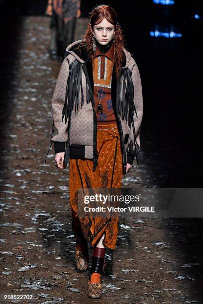 Model walks the runway at the Coach 1941 Ready to Wear Fall/Winter 2018-2019 Fashion show during New York Fashion Week on February 13, 2018 in New...