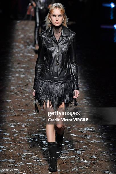 Model walks the runway at the Coach 1941 Ready to Wear Fall/Winter 2018-2019 Fashion show during New York Fashion Week on February 13, 2018 in New...