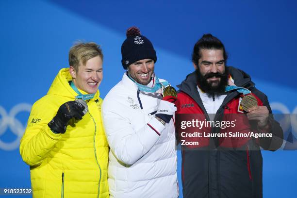 Jarryd Hughes of Australia wins the silver medal, Pierre Vaultier of France wins the gold medal, Regino Hernandez of Spain wins the bronze medal...