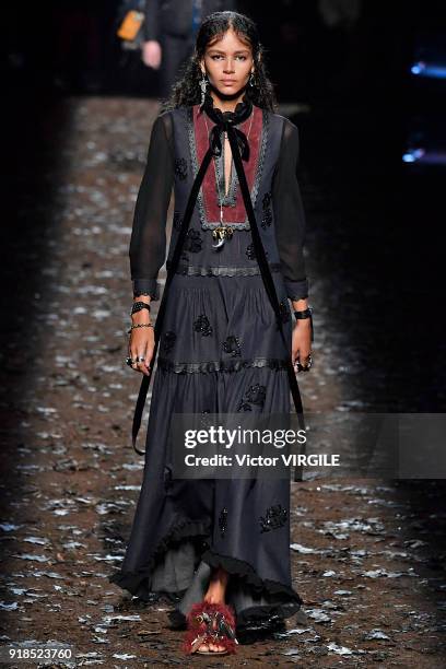 Model walks the runway at the Coach 1941 Ready to Wear Fall/Winter 2018-2019 Fashion show during New York Fashion Week on February 13, 2018 in New...