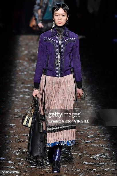 Model walks the runway at the Coach 1941 Ready to Wear Fall/Winter 2018-2019 Fashion show during New York Fashion Week on February 13, 2018 in New...