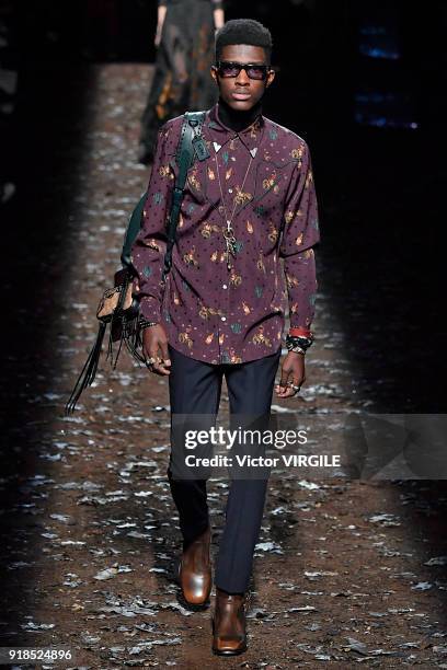 Model walks the runway at the Coach 1941 Ready to Wear Fall/Winter 2018-2019 Fashion show during New York Fashion Week on February 13, 2018 in New...