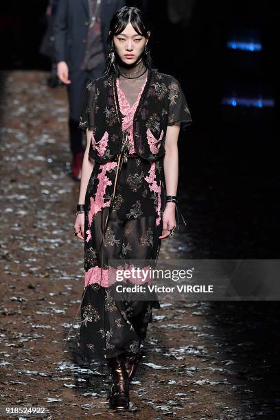 Model walks the runway at the Coach 1941 Ready to Wear Fall/Winter 2018-2019 Fashion show during New York Fashion Week on February 13, 2018 in New...