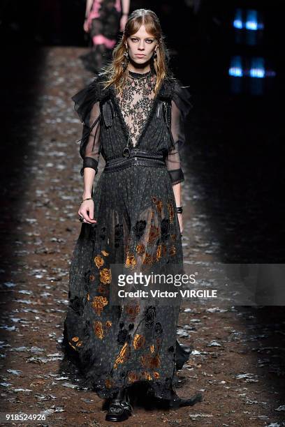Model walks the runway at the Coach 1941 Ready to Wear Fall/Winter 2018-2019 Fashion show during New York Fashion Week on February 13, 2018 in New...