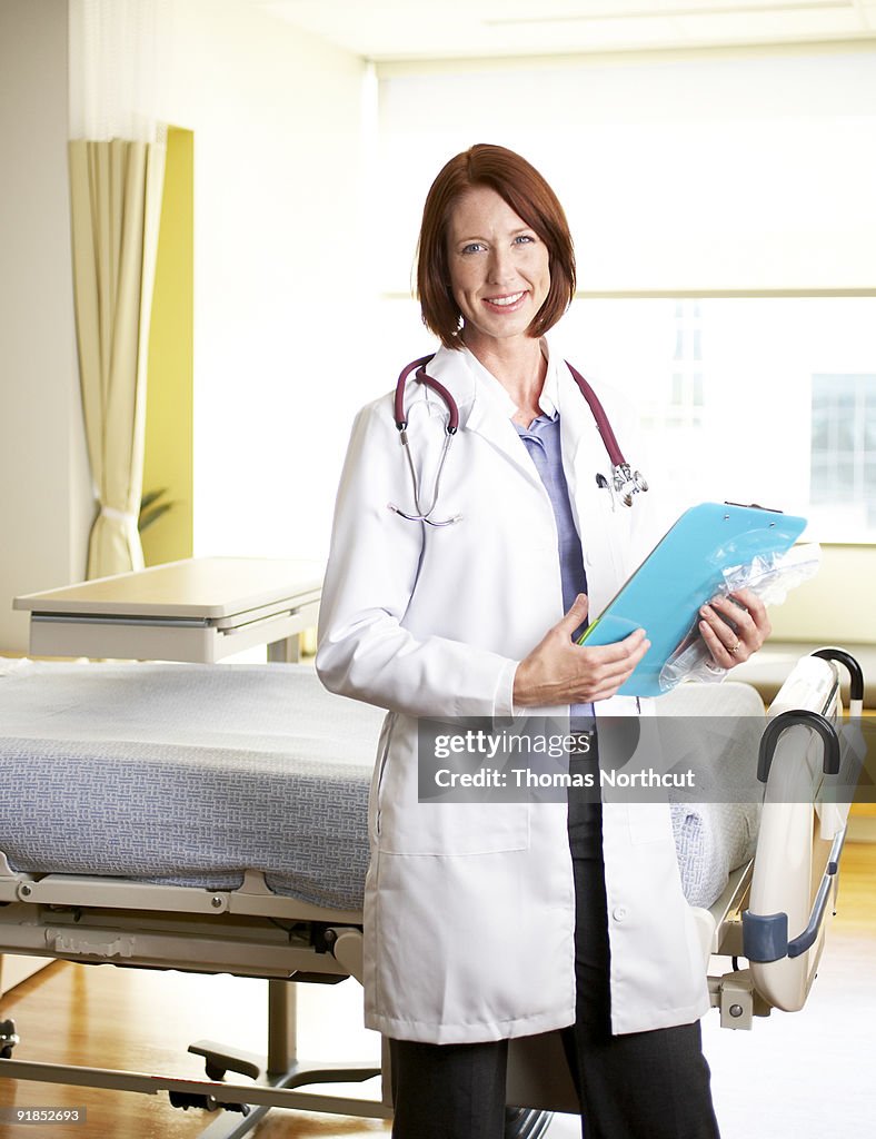 Female doctor in hospital room