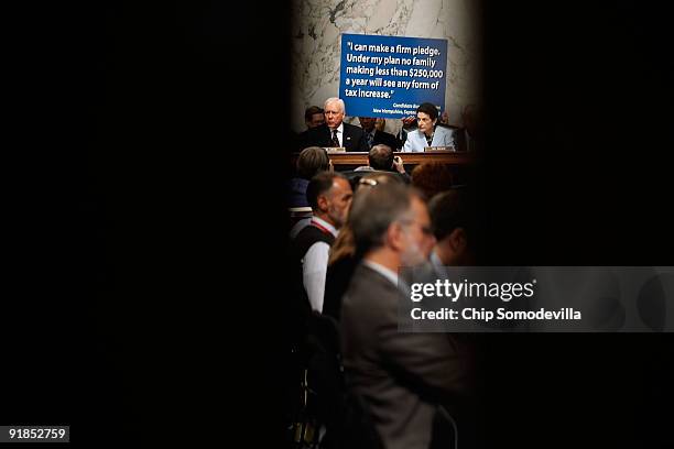 Senate Finance Committee members Sen. Orrin Hatch and Sen. Olympia Snowe present opening statements before the committee is set to vote on health...