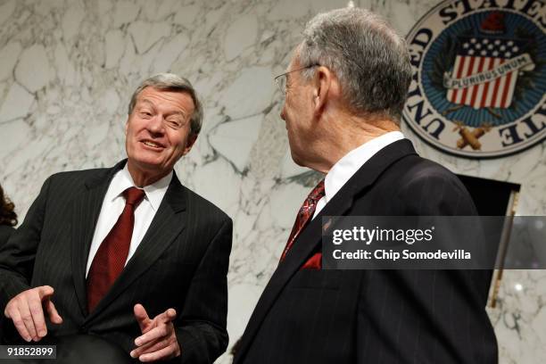 Senate Finance Committee Chairman Max Baucus talks with ranking member Sen. Charles Grassley before the committee is set to vote on health care...