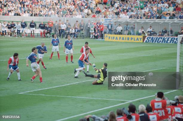 Soccer - 1998 World Cup - France Vs Paraguay match - French soccer player Laurent Blanc scores a goal against Paraguay