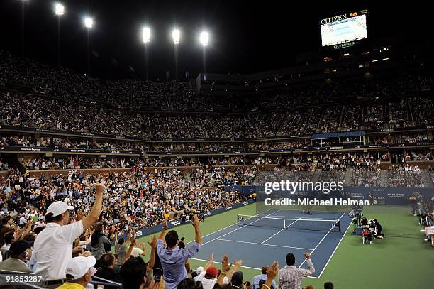 Juan Martin Del Potro of Argentina celebrates after defeating Roger Federer of Switzerland to win the Men's Singles final on day fifteen of the 2009...