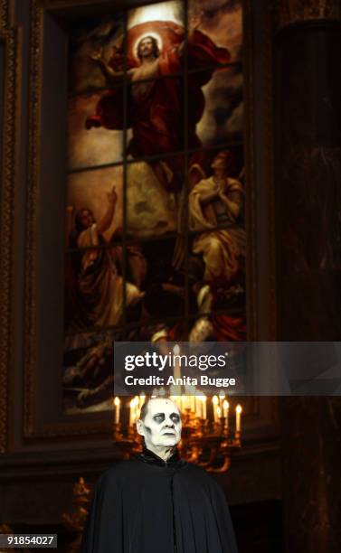 Actor Guenter Jungahns performs on stage during the 'Jedermann' dress rehearsal at the Berlin Cathedral Church on October 13, 2009 in Berlin, Germany.