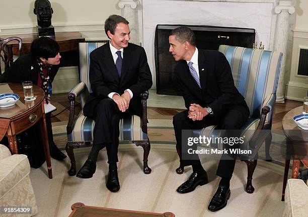 Spanish Prime Minister Jose Luis Rodriguez Zapatero talks with U.S. President Barack Obama in the Oval Office the White House on October 13, 2009 in...