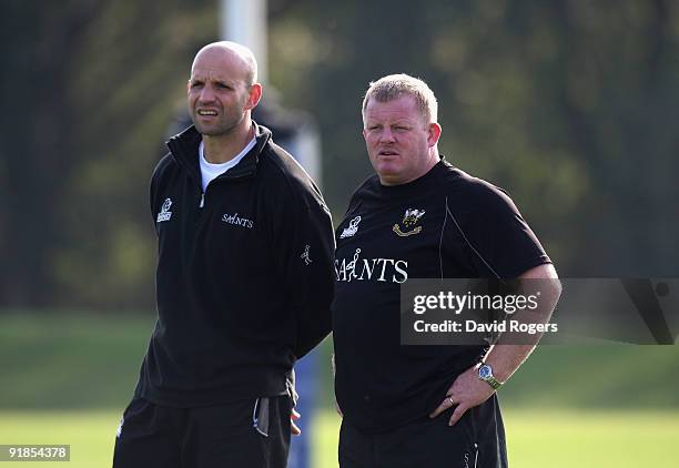 Saints' director of rugby Jim Mallinder and his assistant Dorian West look on during the Northampton Saints training session held at Franklin's...