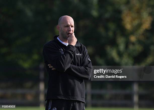 Saints' director of rugby Jim Mallinder looks on during the Northampton Saints training session held at Franklin's Gardens on October 13, 2009 in...