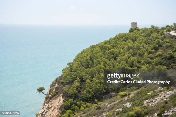 landscape of sierra de irta natural park in the mediterranean sea - costa_del_azahar stock pictures, royalty-free photos & images