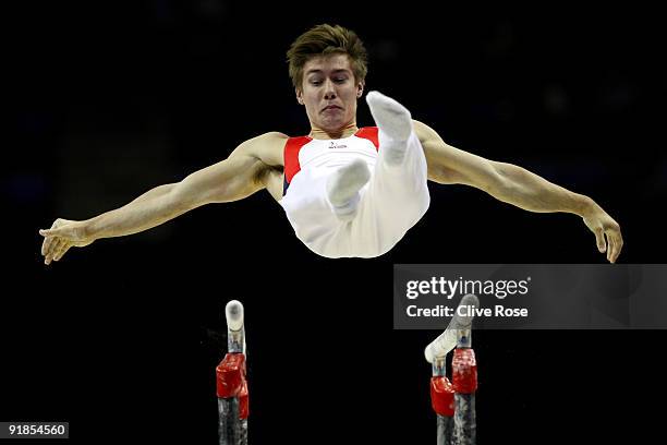 Steffen Kristensen of Norway competes in the parallel bars during the Artistic Gymnastics World Championships 2009 at O2 Arena on October 13, 2009 in...