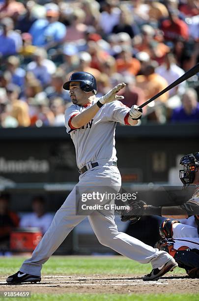 Mike Lowell of the Boston Red Sox bats against the Baltimore Orioles on September 20, 2009 at Camden Yards in Baltimore, Maryland.