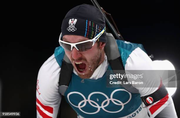 Dominik Landertinger of Austria reacts at the finish during the Men's 20km Individual Biathlon at Alpensia Biathlon Centre on February 15, 2018 in...