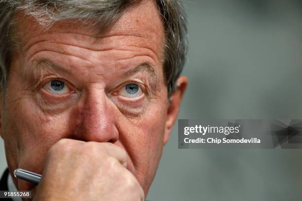 Senate Finance Committee Chairman Max Baucus listens to debate before the committee is set to vote on health care reform legislation on Capitol Hill...