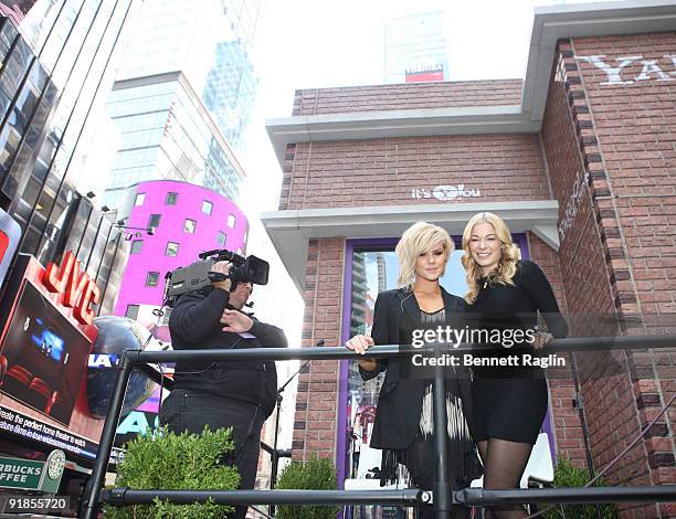 Personality Kimberly Caldwell and LeAnn Rimes attend the It's Y!ou Yahoo! yodel competition at Military Island, Times Square on October 13, 2009 in...