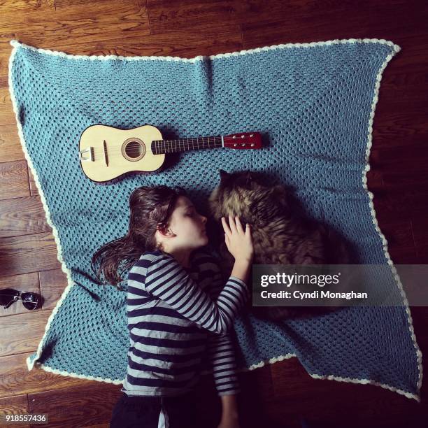 ukulele, girl and cat - maine coon cat stock pictures, royalty-free photos & images