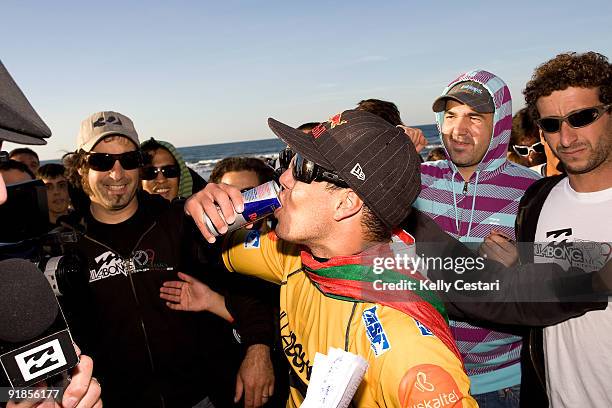 Adriano de Souza of Brazil is interviewed on the beach after winning the final of the Billabong Pro on October 13, 2009 at Sopelana, Spain. De Souza...