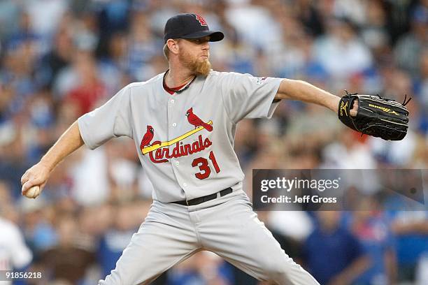 Ryan Franklin of the St. Louis Cardinals pitches in the ninth inning against the Los Angeles Dodgers before blowing the save in Game Two of the NLDS...