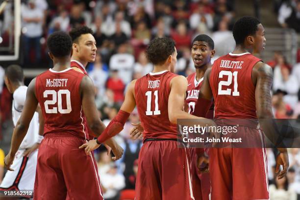 The Oklahoma Sooners gather at mid court after a time out during the game against the Texas Tech Red Raiders on February 13, 2018 at United...