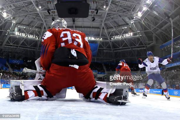 Minho Cho of Korea scores a goal against Pavel Francouz of the Czech Republic in the first period during the Men's Ice Hockey Preliminary Round Group...