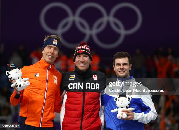 Silver medalist Jorrit Bergsma of the Netherlands, gold medalist Ted-Jan Bloemen of Canada and bronze medalist Nicola Tumolero of Italy celebrate...