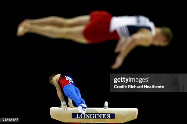 Cyril Tomasone of France and Steven Legendre of United States compete during the Artistic Gymnastics World Championships 2009 at O2 Arena on October...