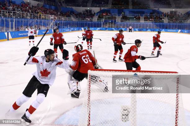Rene Bourque of Canada scores a goal against Switzerland during the Men's Ice Hockey Preliminary Round Group A game on day six of the PyeongChang...