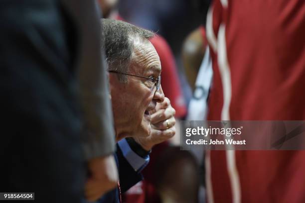 Head coach Lon Kruger of the Oklahoma Sooners talks with his team at a time out during the game against the Texas Tech Red Raiders on February 13,...