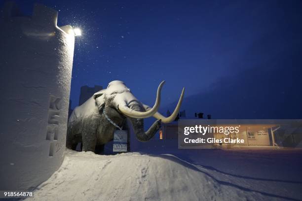 Sculpted mammoth at the entrance of the Kemi Snow Castle. Pure white snow walls surround the gigantic SnowCastle built entirely out of snow and ice,...