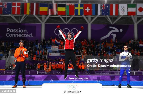 Silver medalist Jorrit Bergsma of the Netherlands, gold medalist Ted-Jan Bloemen of Canada and bronze medalist Nicola Tumolero of Italy celebrate...