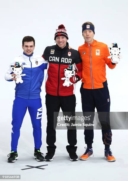 Bronze medalist Nicola Tumolero of Italy, gold medalist Ted-Jan Bloemen of Canada and silver medalist Jorrit Bergsma of the Netherlands celebrate...