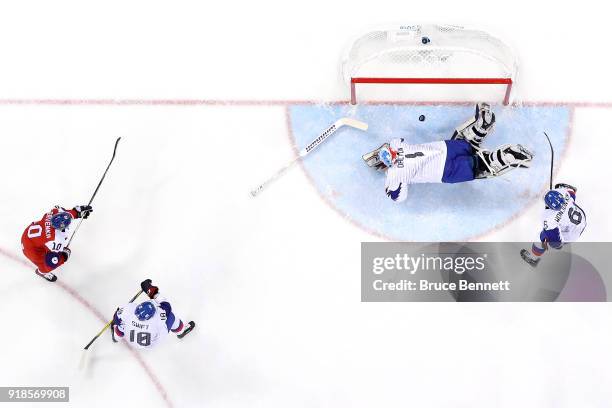 Matt Dalton of Korea makes a save against Roman Cervenka of the Czech Republic during the first period during the Men's Ice Hockey Preliminary Round...