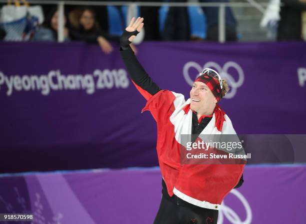 Pyeongchang- FEBRUARY 15 - Ted-Jan Bloemen of Canada takes a victory lap after winning the gold medal in Olympic record time in the men's 10000...