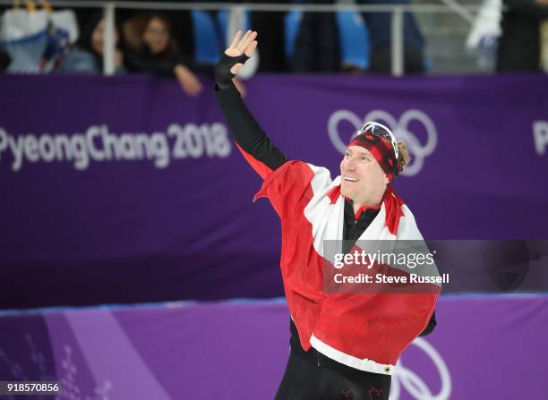 Pyeongchang- FEBRUARY 15 - Ted-Jan Bloemen of Canada takes a victory lap after winning the gold medal in Olympic record time in the men's 10000...