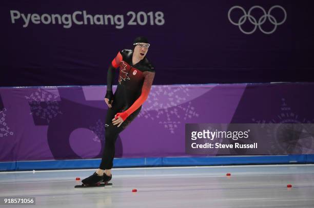 Pyeongchang- FEBRUARY 15 - Ted-Jan Bloemen of Canada looks at the clock as he wins the gold medal in Olympic record time in the men's 10000 metres in...