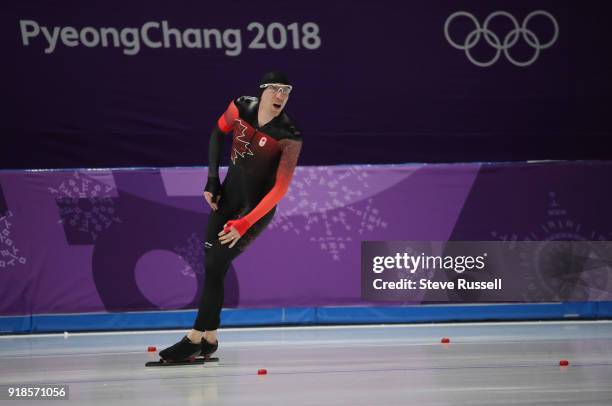 Pyeongchang- FEBRUARY 15 - Ted-Jan Bloemen of Canada looks at the clock as he wins the gold medal in Olympic record time in the men's 10000 metres in...