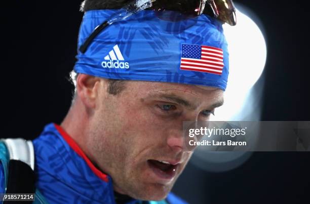 Tim Burke of the United States reacts at the finish during the Men's 20km Individual Biathlon at Alpensia Biathlon Centre on February 15, 2018 in...