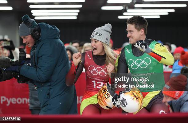 Natalie Geisenberger and Johannes Ludwig of Germany celebrate as their team wins the Luge Team Relay at Olympic Sliding Centre on February 15, 2018...