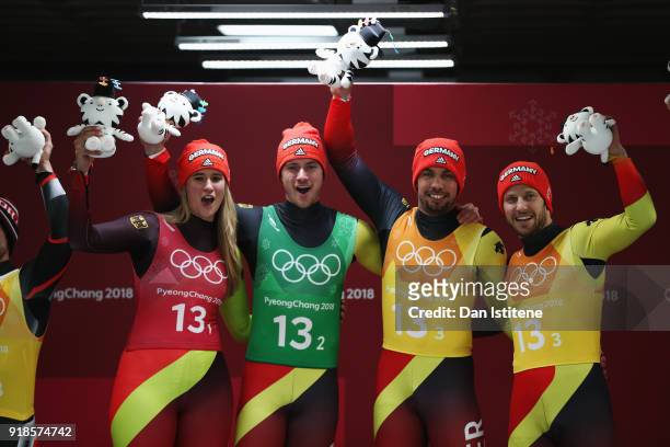 Natalie Geisenberger, Johannes Ludwig, Tobias Wendl and Tobias Arlt of Germany celebrate winning gold in the Luge Team Relay on day six of the...