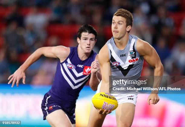 Jack Trengove of the Power and Andrew Brayshaw of the Dockers in action during the AFLX match between the Port Adelaide Power and the Fremantle...