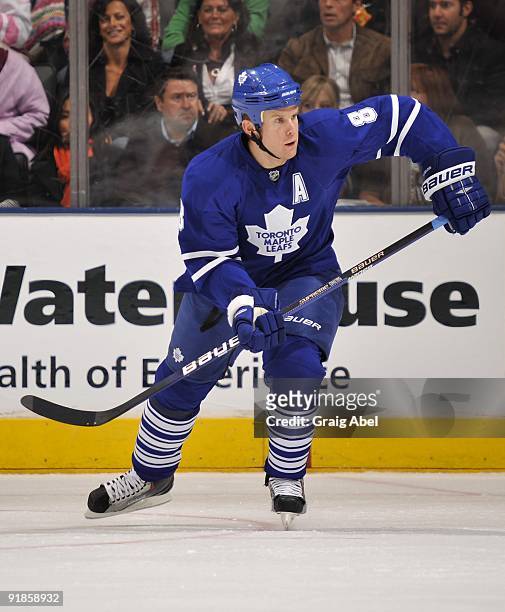 Mike Komisarek of the Toronto Maple Leafs skates up ice during game action against the Pittsburgh Penguins October 10, 2009 at the Air Canada Centre...